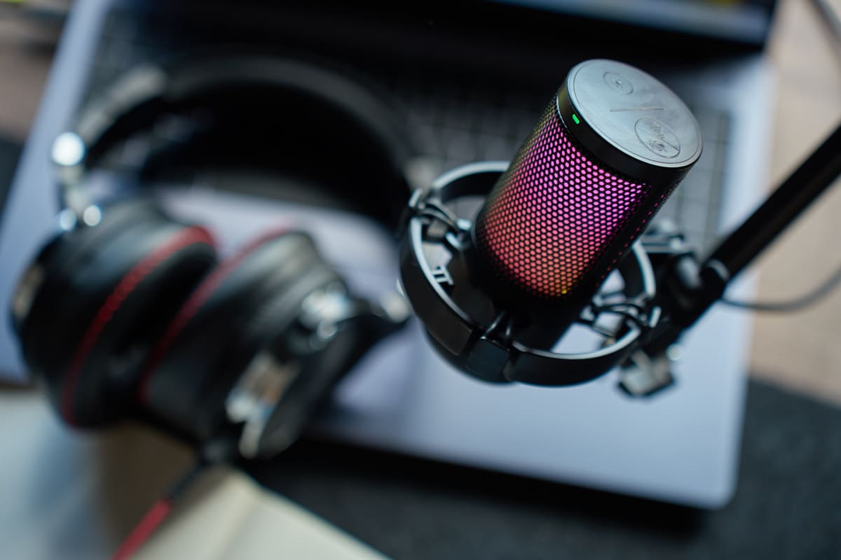 Driver adjusting the car radio dial